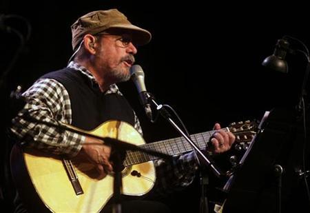 Cuban musician Silvio Rodriguez gives a concert in front of the Lopez presidential palace in Asuncion